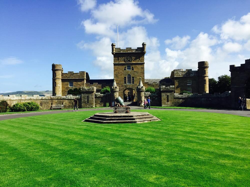 Castle like building with grass